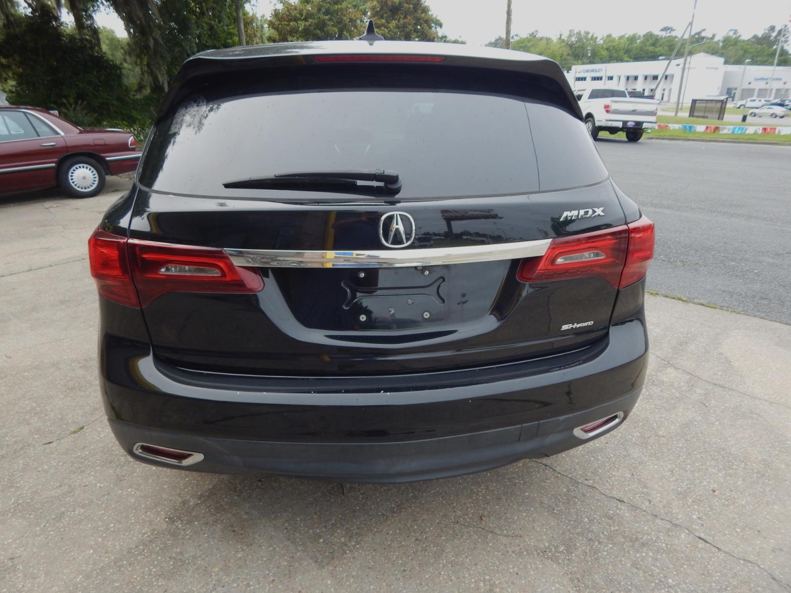 2014 Black /Tan Leather Acura MDX (5FRYD4H2XEB) with an 3.5L V6 engine, Automatic transmission, located at 3120 W Tennessee St, Tallahassee, FL, 32304-1002, (850) 575-6702, 30.458841, -84.349648 - Used Car Supermarket is proud to present you with this loaded immaculate 2014 Acura MDX SH-AWD with leather, sunroof and 3rd row seating. Used Car Supermarket prides itself in offering you the finest pre-owned vehicle in Tallahassee. Used Car Supermarket has been locally family owned and operated fo - Photo #2